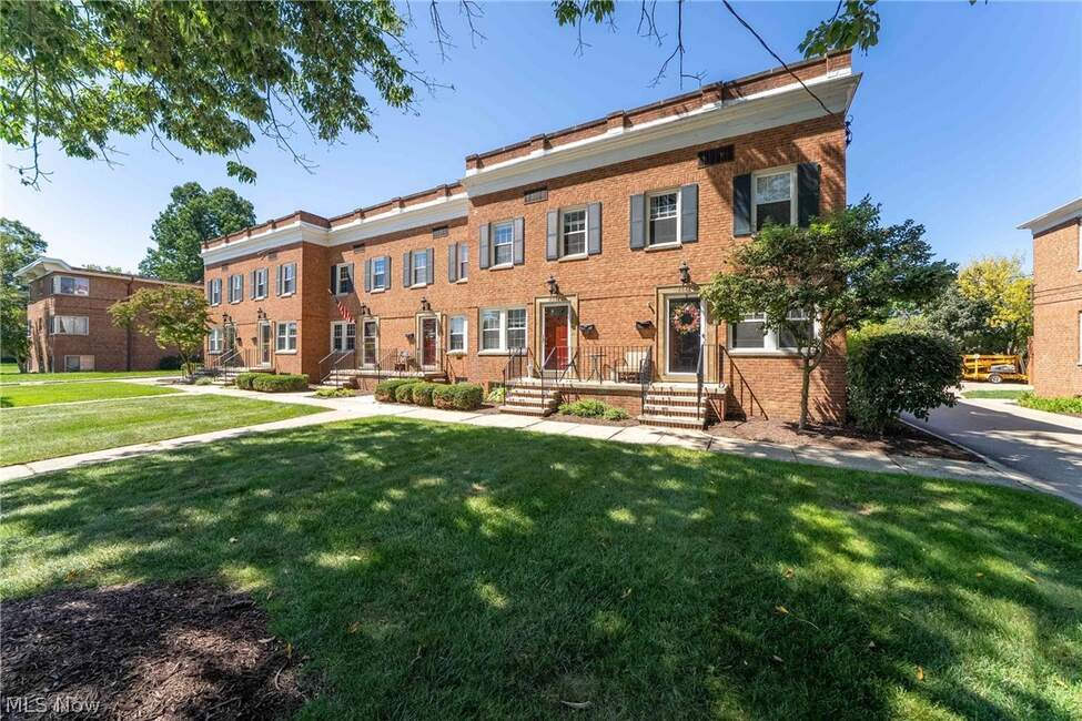 Angled brick exterior and lawn